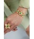 Goudkleurige bloemen armband met groene steentjes