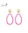 Roze oorhangers met glas steentjes