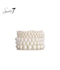 Armband met witte parels en goudkleur accenten van het merk Sweet7